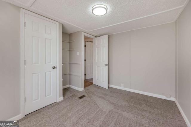 4419 New Kings Bridge Rd, Nicholson, GA 30565 - unfurnished bedroom with carpet, a textured ceiling, and baseboards