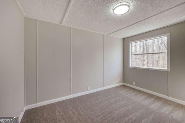 4419 New Kings Bridge Rd, Nicholson, GA 30565 - carpeted empty room with a textured ceiling and baseboards