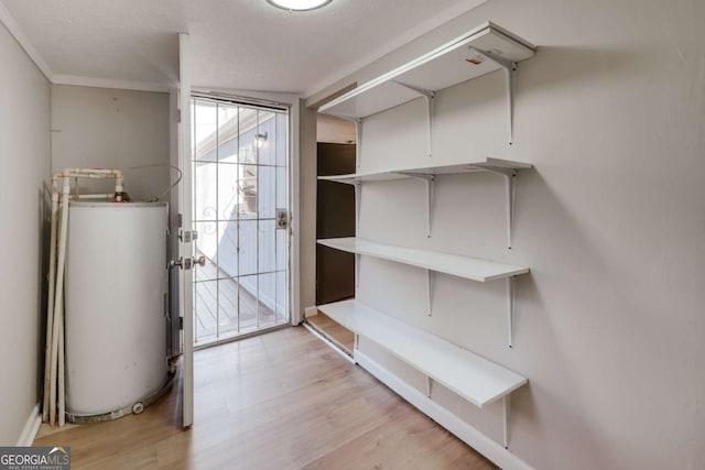 4419 New Kings Bridge Rd, Nicholson, GA 30565 - utility room with gas water heater