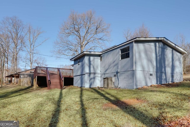 4419 New Kings Bridge Rd, Nicholson, GA 30565 - view of outdoor structure featuring central AC unit and stairway