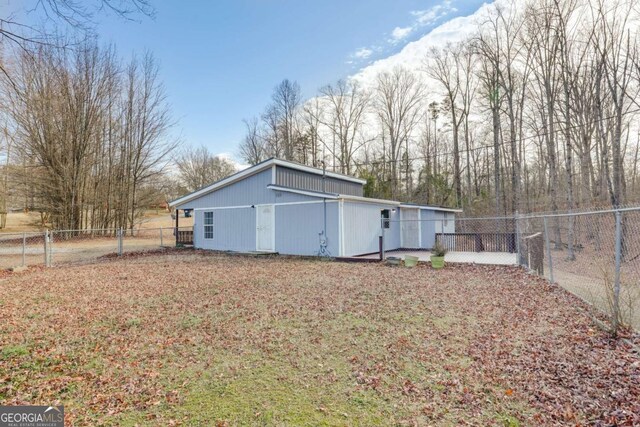 4419 New Kings Bridge Rd, Nicholson, GA 30565 - rear view of property featuring a fenced backyard