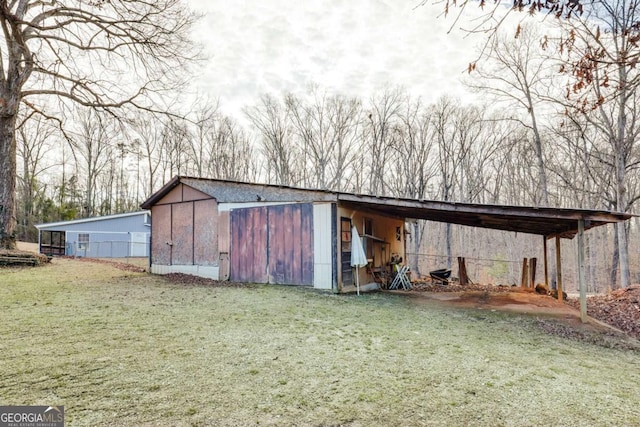 4419 New Kings Bridge Rd, Nicholson, GA 30565 - view of pole building with a yard and a carport