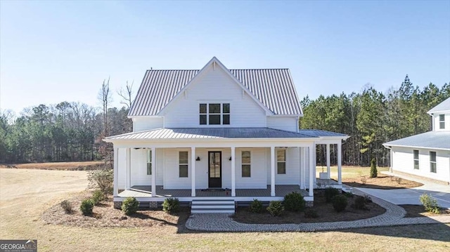 modern farmhouse featuring covered porch