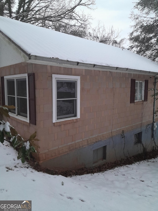 view of snow covered property