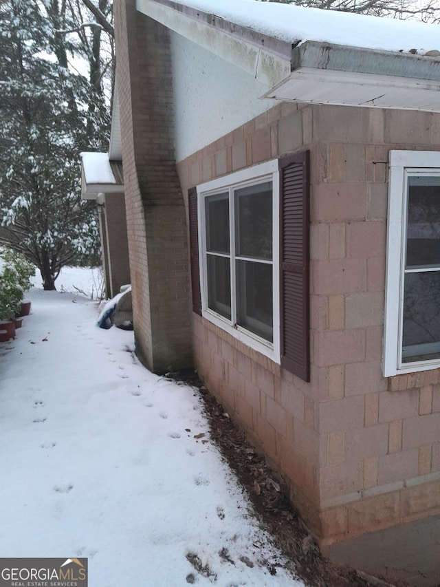 view of snow covered property