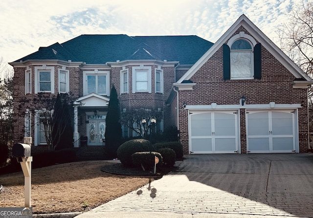 view of front of property featuring a garage