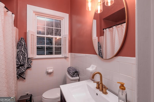 bathroom featuring sink and toilet