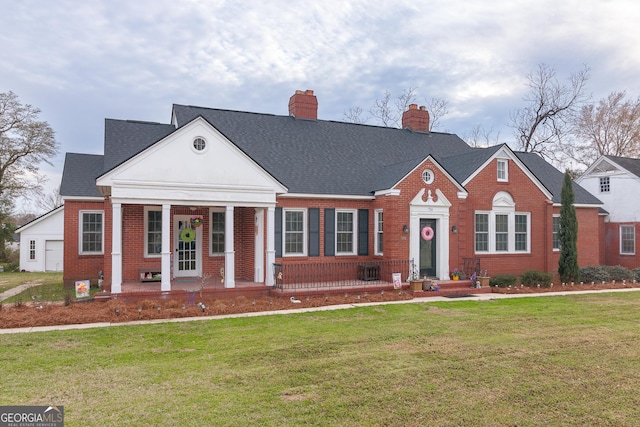 view of front of property with a front yard and a porch