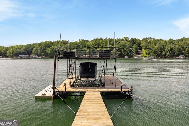 dock area featuring a water view