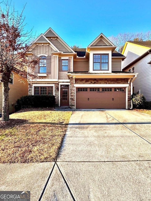 craftsman house featuring a garage