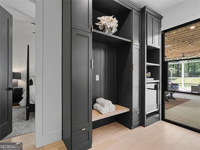 mudroom featuring wood-type flooring