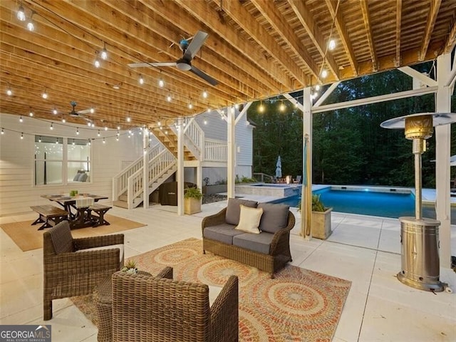 view of patio featuring outdoor lounge area and ceiling fan