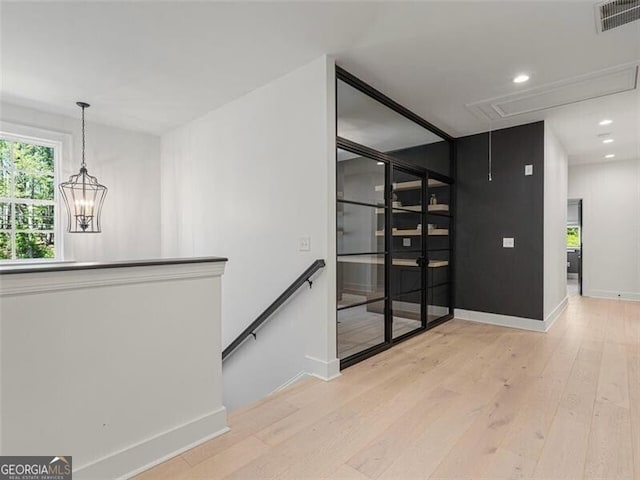 hall featuring light hardwood / wood-style floors