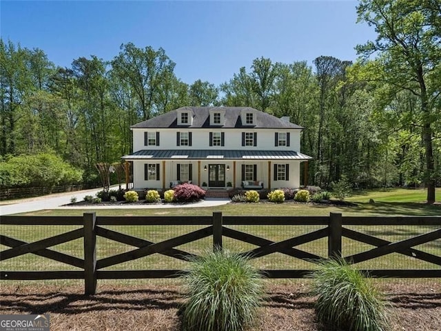 exterior space featuring a front yard and a porch