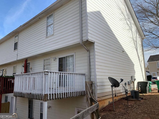 view of property exterior featuring central AC