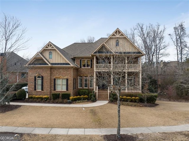 craftsman-style home with covered porch and a balcony