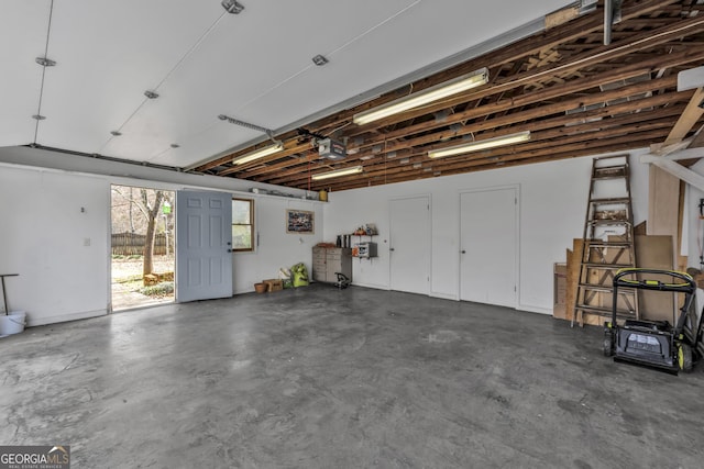 garage featuring a garage door opener