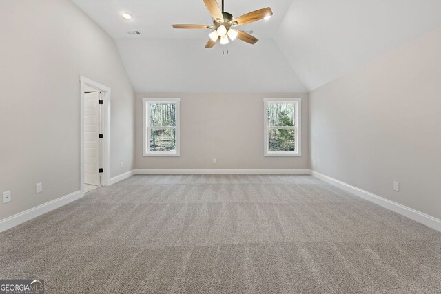 1578 English Rd, Forsyth, GA 31029 - unfurnished room featuring healthy amount of natural light, ceiling fan, light carpet, and lofted ceiling