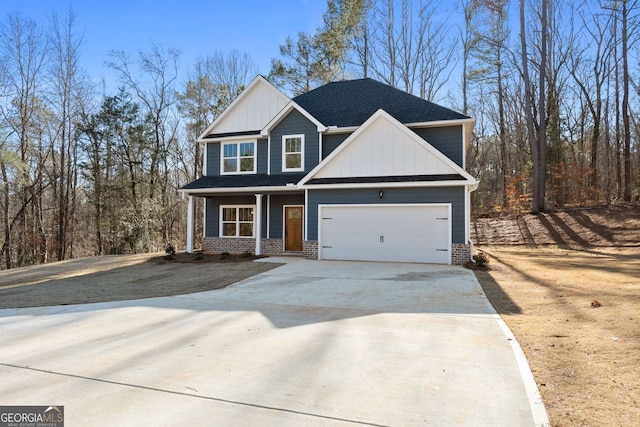 view of front of home featuring board and batten siding, a porch, brick siding, concrete driveway, and an attached garage
