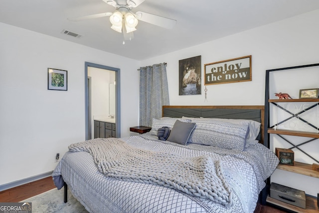 bedroom with hardwood / wood-style floors and ceiling fan