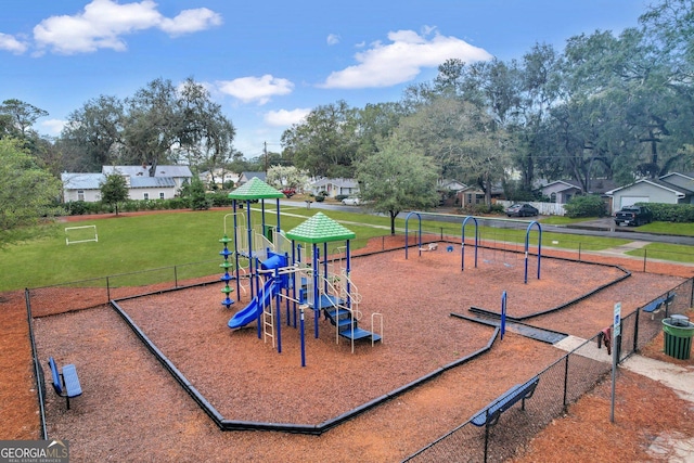 view of playground featuring a yard