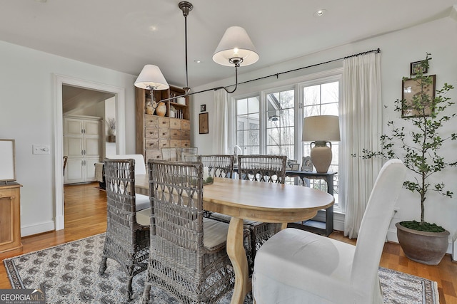 dining area featuring hardwood / wood-style floors