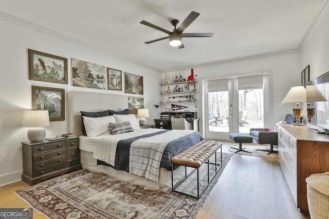 bedroom with french doors, light hardwood / wood-style flooring, access to exterior, ornamental molding, and ceiling fan