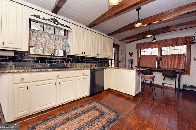 kitchen with kitchen peninsula, decorative light fixtures, sink, dishwasher, and dark hardwood / wood-style floors