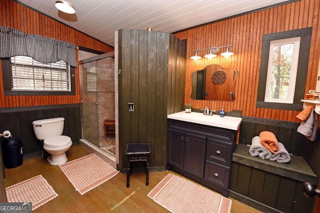 bathroom featuring hardwood / wood-style flooring, toilet, an enclosed shower, wooden ceiling, and vanity