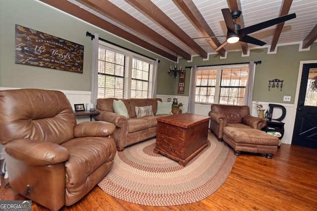 living room with beam ceiling, ceiling fan, wooden ceiling, and hardwood / wood-style flooring