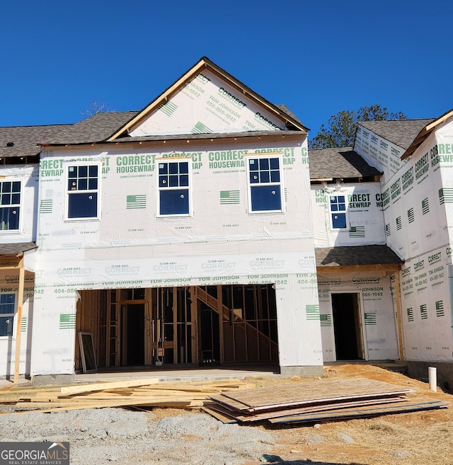 property under construction featuring a garage