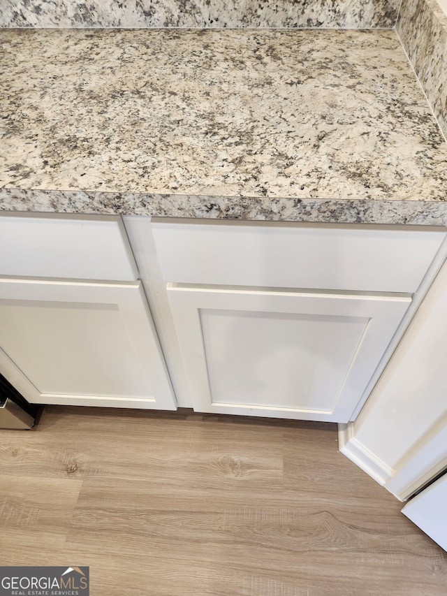 26 Russet Way Lot 61, Newnan, GA 30263 - kitchen view of wood finished floors, light countertops, and white cabinetry