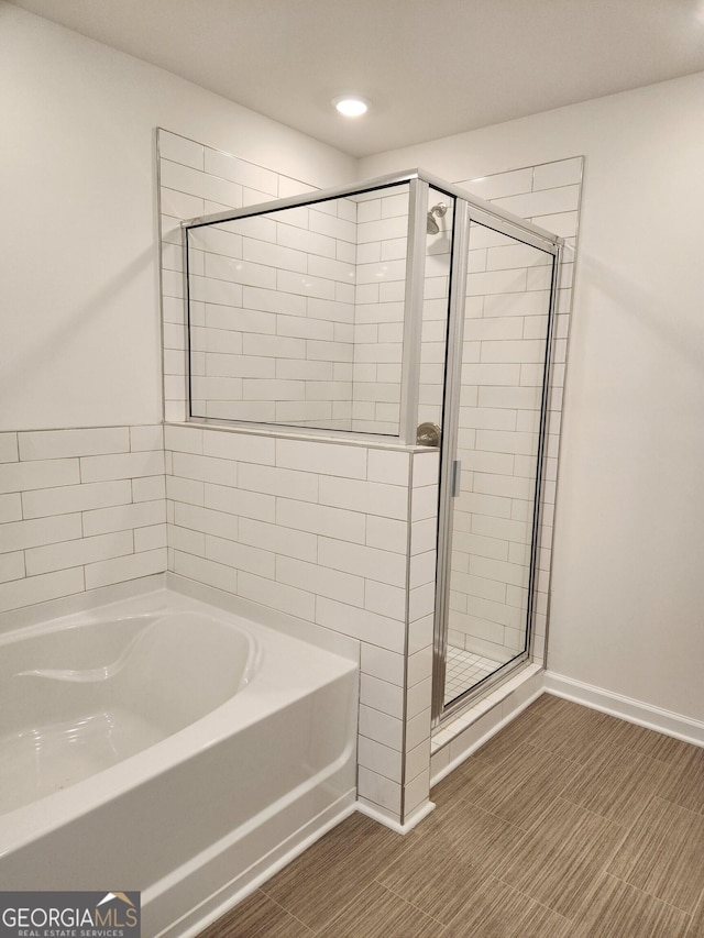 26 Russet Way Lot 61, Newnan, GA 30263 - bathroom featuring a stall shower, a bath, and recessed lighting