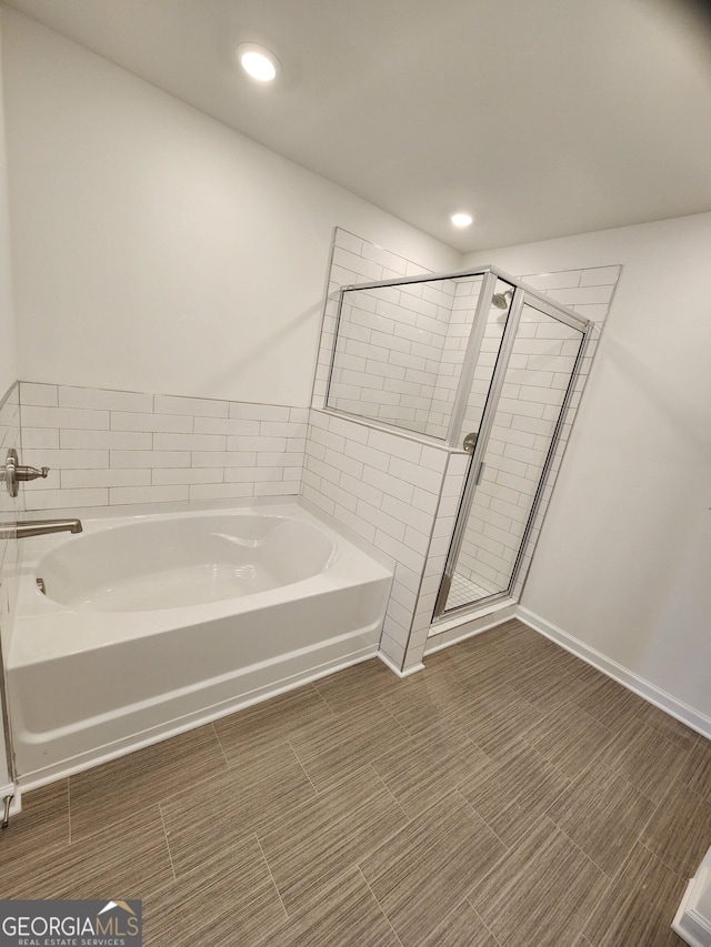 26 Russet Way Lot 61, Newnan, GA 30263 - full bathroom featuring a garden tub, a stall shower, and recessed lighting