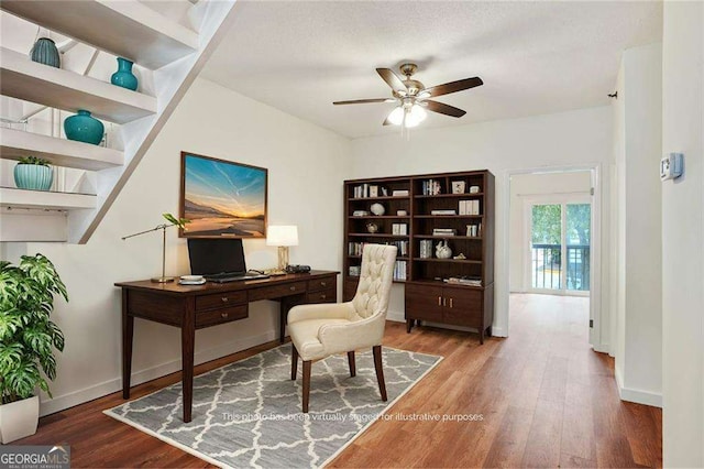 home office with ceiling fan and wood-type flooring