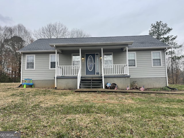 view of front of home with a front yard and a porch