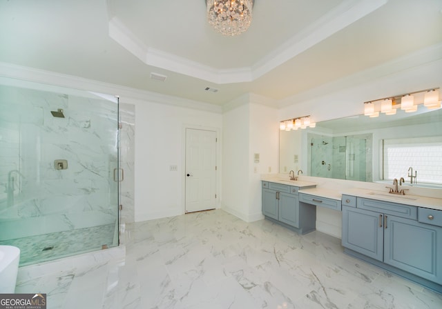 bathroom with a tray ceiling, ornamental molding, vanity, and an enclosed shower