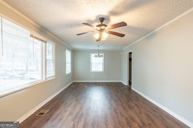 unfurnished room with ceiling fan with notable chandelier, a textured ceiling, dark hardwood / wood-style floors, and ornamental molding