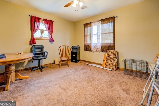 sitting room featuring carpet flooring and ceiling fan