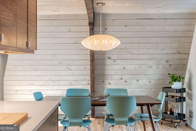 dining room featuring light wood finished floors