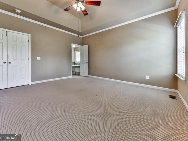 bathroom with visible vents, tiled shower, toilet, tile patterned flooring, and vanity