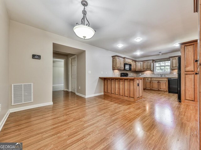 dining area with dark wood finished floors