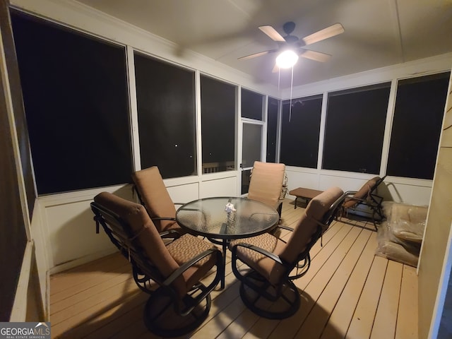 sunroom / solarium with ceiling fan