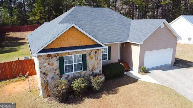 view of front of property with a garage