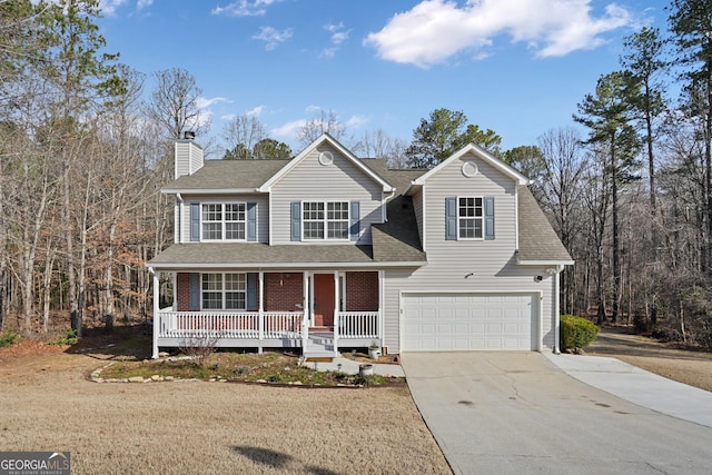 traditional home featuring covered porch, a garage, driveway, a front lawn, and a chimney