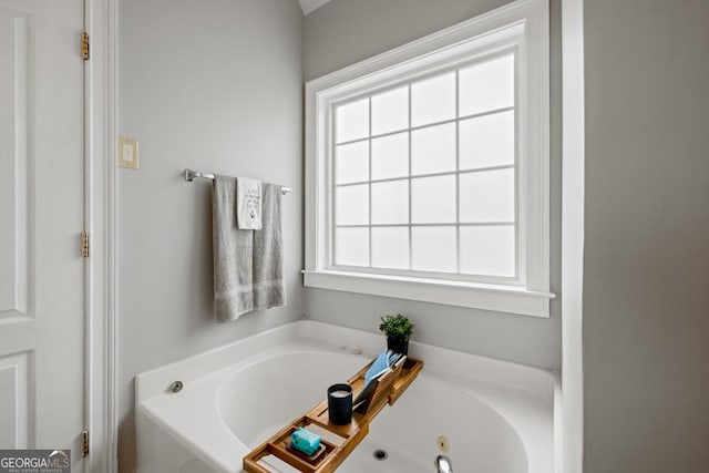 bathroom featuring a whirlpool tub