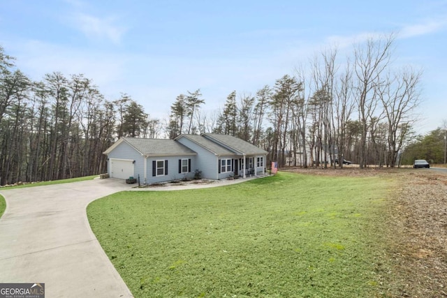 single story home featuring a garage and a front yard