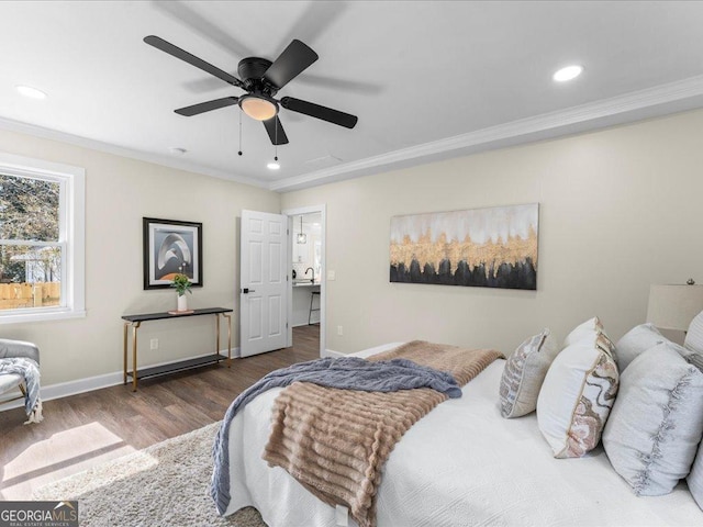 bedroom featuring ceiling fan, crown molding, and dark hardwood / wood-style flooring