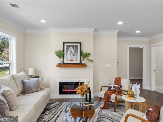 living room featuring electric panel, wood-type flooring, and ornamental molding