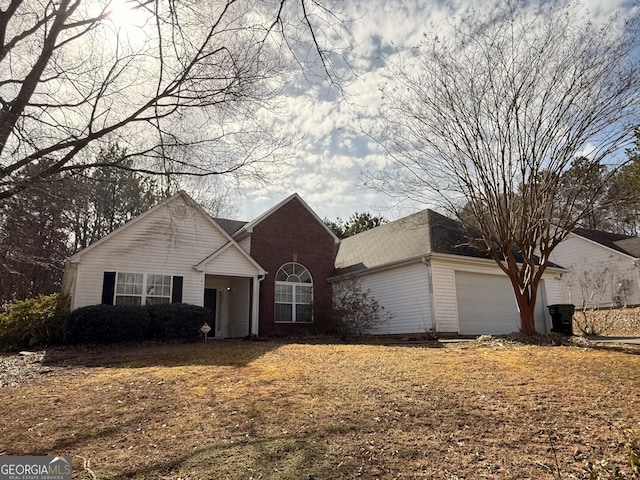 view of front of property with a garage